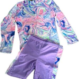 Multi-coloured long sleeve swimsuit with shorts.  Girls' size XL.